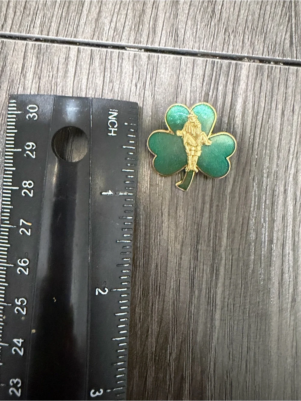 Vintage Green Shamrock Enamel Pin with Gold-tone Rescue Figure